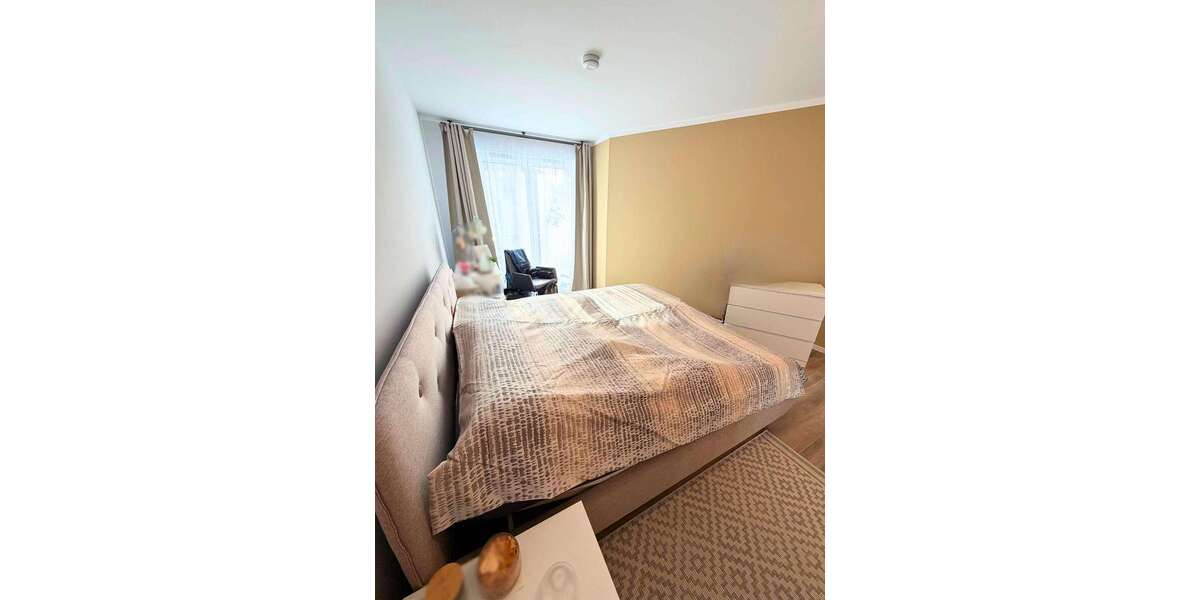 Schlafzimmer mit Balkonzugang